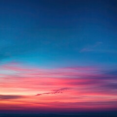 Fototapeta premium Vibrant sunset sky with soft clouds