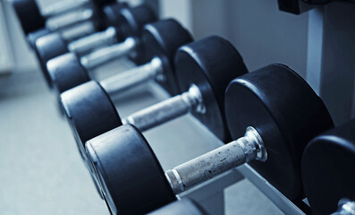 Obraz premium Dumbbells For Strength Training And Bodybuilding In The Gym