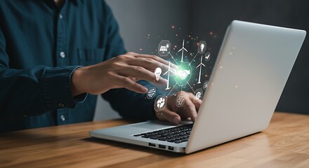 Hands Interacting with Green Energy Icons on Laptop Screen