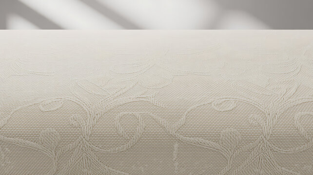 Cream textured fabric background with floral pattern