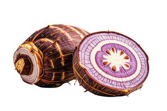 Fresh organic taro root cut in half on black background