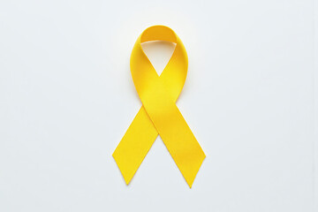 yellow ribbon on a gray background