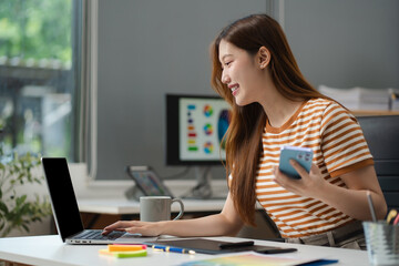 Designer woman thinking ideas strategy about mobile app interface wireframe design with customer...
