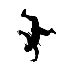 Silhouette of a ninja performing a backflip with dynamic pose
