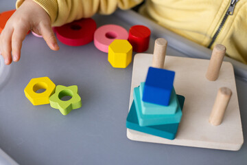 Educational toy, Cognitive skills, Montessori activity. Closeup, selective focus.