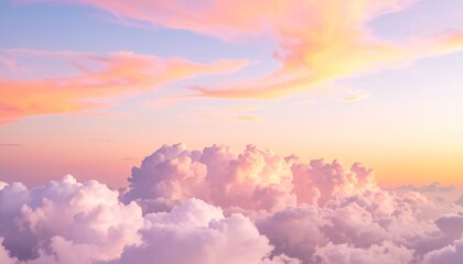 Fototapeta premium Image of pastel pink and orange clouds at sunrise.