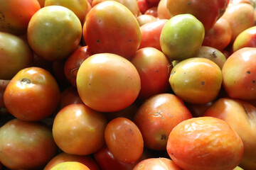 close up of fresh red tomatoes. vitamin a in red tomatoes