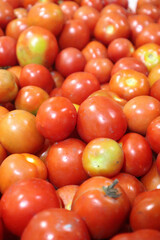 close up of fresh red tomatoes. vitamin a in red tomatoes