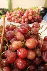 fresh purple grapes. vitamins in purple grapes. healthy food concept