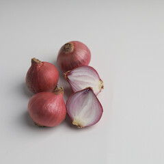 Shallots on white background