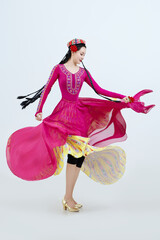 Beautiful dancers performing traditional Uyghur dance from Xinjiang, China
