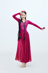 Beautiful dancers performing traditional Uyghur dance from Xinjiang, China