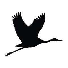Elegant Silhouette of a Crane Soaring Through the Sky with Open Wings