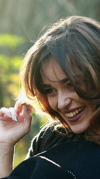 Autumn woman in autumn park. Autumn woman in autumn park. Warm sunny weather. Fall concept