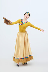 Beautiful dancers performing traditional Tibetan Guozhuang dance in Tibet, China