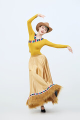Beautiful dancers performing traditional Tibetan Guozhuang dance in Tibet, China