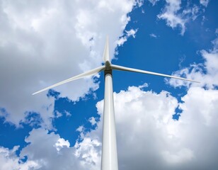 Wind Turbine Against Blue Sky with White Clouds in Background