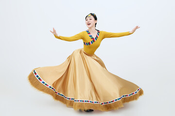 Beautiful dancers performing traditional Tibetan Guozhuang dance in Tibet, China
