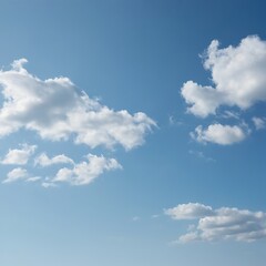 Fototapeta premium Fluffy white clouds in a blue sky