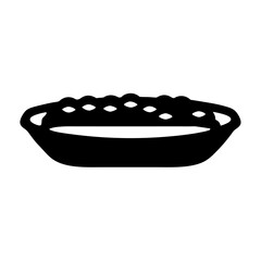 A silhouetted black and white image of a small fruit tart