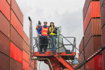 Team of Workers Standing on Crane in Container Yard, Logistics Engineers Inspecting Shipping Containers at Cargo Port