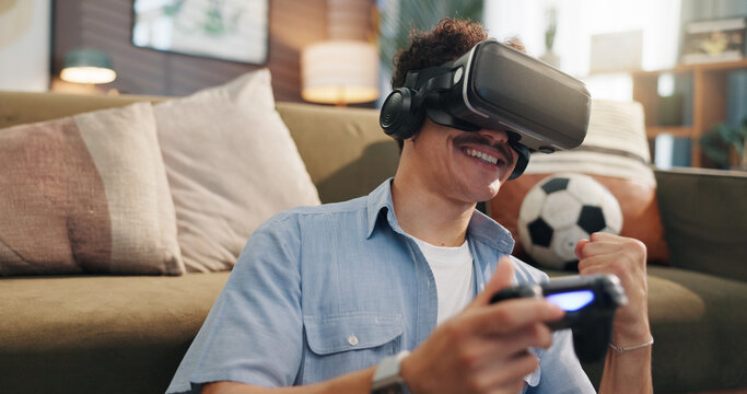 House, gamer and man with vr headset, controller and excited for win on website and virtual reality. Playing, video games and person with eyewear for entertainment, winner and simulation of soccer