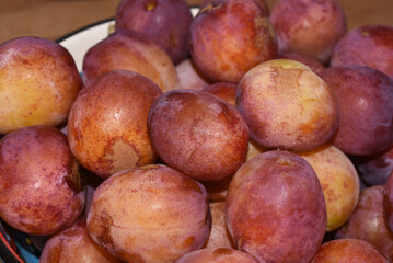 Closeup on fresh raw red plums