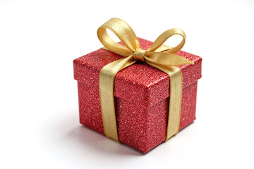 Fototapeta premium red gift box with a gold ribbon and bow