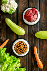 Natural pet food and ingredients - meat and vegetables zucchini, carrots and greens, cauliflower