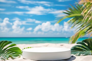Obraz premium A white circular platform sits on a sandy beach, framed by tropical foliage, with a turquoise sea and blue, cloudy sky in the background.