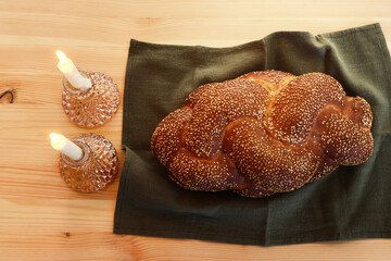 Image of Shabbat, challah bread, wine and candles