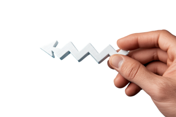 Hand holding a zigzagging arrow