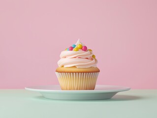 A minimalist image of a single pastel cupcake centered on a white plate or directly on a clean pastel background.