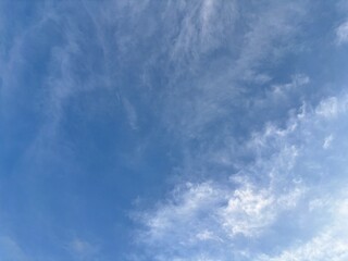 clean bright blue sky background with beautiful clean white clouds, creative natural background