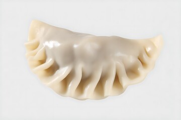 Naklejka premium Single steamed dumpling on a white surface