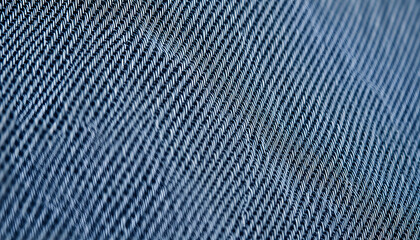 "Extreme closeup of dark gray denim fabric texture, tightly woven with a subtle diagonal pattern", collage style. isolated with white highlights
