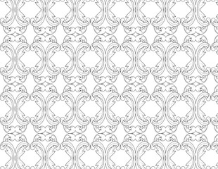 Ornate black and white pattern showcasing detailed designs in a repeating motif
