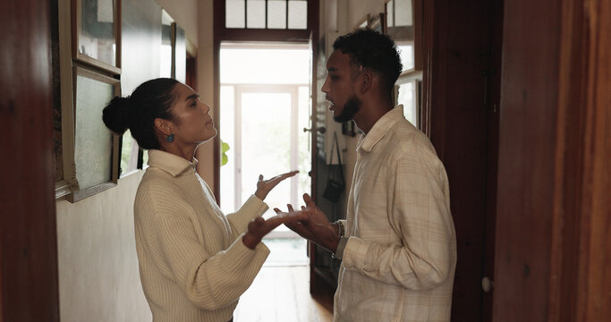 Argument, disagreement or dispute with man and woman in home for conflict or fight resolution. Anger, drama or frustration with boyfriend and girlfriend in apartment for blame, discussion or mistake - Powered by Adobe