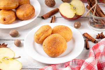 Tasty homemade apple pie autumn tasty donuts with cinnamon sugar glazing
