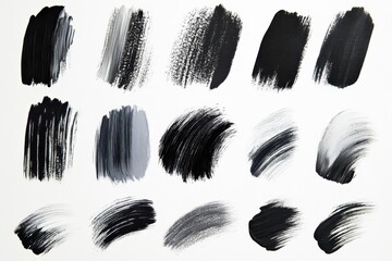 Monochrome paint strokes with textures isolated on a white canvas backdrop. Use for graphic design, backgrounds, or artistic digital compositions.