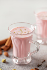 Pink Tea Kashmiri Chai. Traditional Kashmiri tea with  sliced pistachios, almonds. Pakistani cuisine