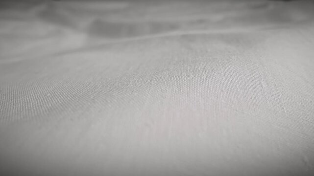 Textured White Fabric with Soft Folds Displayed