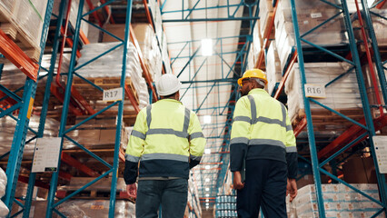Low angle, back and people at distribution warehouse for shipping, logistics and delivery team....