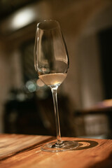 Champagne Glasses on Wooden Table in Restaurant