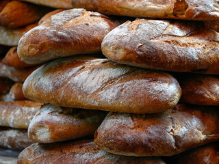 Closeup of freshly baked  artisanal French white loves of bread (Le Pain Blanc)