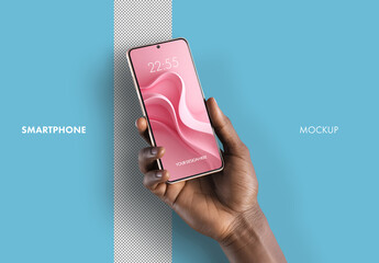 A womans hand holding a smartphone mockup