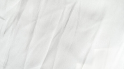 Delicate wrinkled white silk with airy folds and minimalistic shine