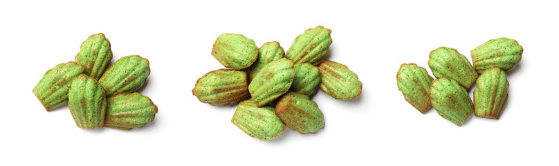 Tasty matcha madeleine cakes on white background, set. Top view