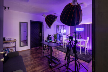 Modern podcast recording studio with professional lighting