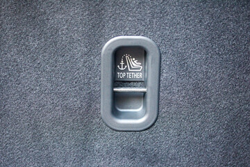 Recessed top tether hook in a new vehicle